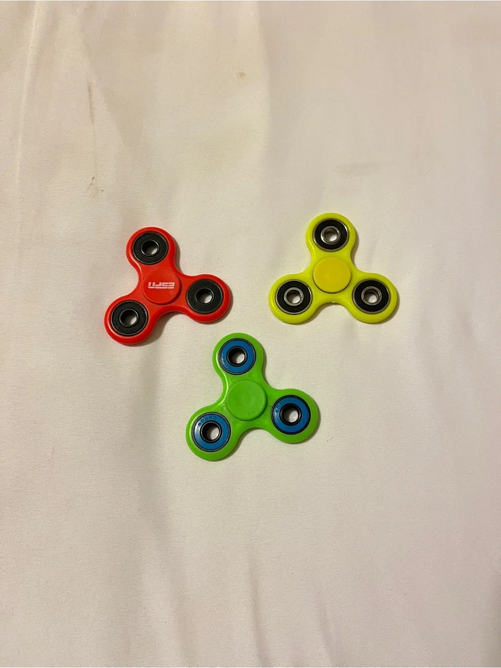 Lot of 3 Fidget Spinners ESPN Dish Network Plastic Toy Red Green Yellow